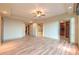 Spacious bedroom with hardwood floors, large windows, and walk-in closet at 9101 Alta Dr # 1406, Las Vegas, NV 89145