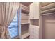 Spacious walk-in closet with custom shelving at 9101 Alta Dr # 1406, Las Vegas, NV 89145