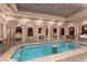 Relaxing hot tub in a spa-like setting with ornate columns at 9101 Alta Dr # 1406, Las Vegas, NV 89145