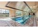 Luxury indoor pool with large windows and marble details at 9101 Alta Dr # 1406, Las Vegas, NV 89145