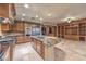 Spacious kitchen with island, stainless steel appliances, and custom cabinetry at 9101 Alta Dr # 1406, Las Vegas, NV 89145