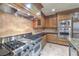 Modern kitchen with stainless steel appliances and granite countertops at 9101 Alta Dr # 1406, Las Vegas, NV 89145