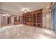 Bright living area with built-in shelving and hardwood floors at 9101 Alta Dr # 1406, Las Vegas, NV 89145