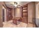 Home office with built-in desk and shelving at 9101 Alta Dr # 1406, Las Vegas, NV 89145
