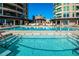 Resort-style pool and spa with lounge chairs at 9101 Alta Dr # 1406, Las Vegas, NV 89145