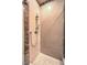 Walk-in shower with marble and neutral tile at 9101 Alta Dr # 1406, Las Vegas, NV 89145
