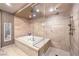 Large walk-in shower with glass enclosure and tile surround at 9101 Alta Dr # 1406, Las Vegas, NV 89145