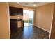 Breakfast nook with dark cabinetry and tile floors at 9869 Juno Hills St, Las Vegas, NV 89178