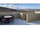 Private rooftop deck with mountain views and seating at 9869 Juno Hills St, Las Vegas, NV 89178