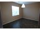 Bright dining room with tile floor and large window at 9869 Juno Hills St, Las Vegas, NV 89178