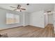 Living room with wood-look floors and ceiling fan at 120 Maple St, Henderson, NV 89015