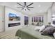 Main bedroom featuring electric fireplace and city views at 1928 Oliver Springs St, Henderson, NV 89052