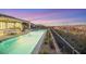 Beautiful pool and patio with mountain views at sunset at 1928 Oliver Springs St, Henderson, NV 89052