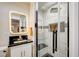 Modern bathroom with walk-in shower and floating vanity at 2240 Mohigan Way, Las Vegas, NV 89169