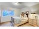 Bright bedroom with a queen-size bed and ample natural light at 2240 Mohigan Way, Las Vegas, NV 89169