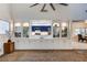 Open-concept living area highlighting built-in shelving, connecting the kitchen to the dining space at 2240 Mohigan Way, Las Vegas, NV 89169