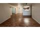 Open concept living and kitchen with wood-look floors at 2606 S Durango Dr # 172, Las Vegas, NV 89117