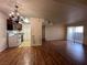 Open concept living and kitchen area with wood-look floors at 2606 S Durango Dr # 172, Las Vegas, NV 89117