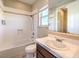 Clean bathroom with a tub, toilet and sink at 3 Palmbrook Ln, Henderson, NV 89052