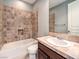 Clean bathroom with tile shower and vanity at 3 Palmbrook Ln, Henderson, NV 89052