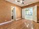 Bright bedroom featuring hardwood floors and access to a bathroom at 3 Palmbrook Ln, Henderson, NV 89052