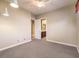 Bright bedroom with ceiling fan and access to bathroom at 3 Palmbrook Ln, Henderson, NV 89052