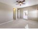 Bright bedroom featuring carpet and patio access at 3 Palmbrook Ln, Henderson, NV 89052