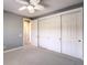 Spacious bedroom with mirrored closet doors at 3 Palmbrook Ln, Henderson, NV 89052