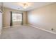 Large bedroom with window and ceiling fan at 3 Palmbrook Ln, Henderson, NV 89052