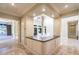 Elegant hallway with high ceilings and granite countertop at 3 Palmbrook Ln, Henderson, NV 89052