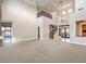 Two story living room with balcony and hardwood floors at 3 Palmbrook Ln, Henderson, NV 89052