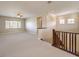 Spacious loft area with high ceilings and carpet at 3 Palmbrook Ln, Henderson, NV 89052