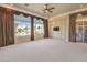 Main bedroom with built-ins and views of the backyard at 3 Palmbrook Ln, Henderson, NV 89052