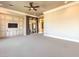 Spacious main bedroom with large windows, built-in cabinets, and ceiling fan at 3 Palmbrook Ln, Henderson, NV 89052