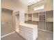 Large walk-in closet with ample shelving and drawers at 3 Palmbrook Ln, Henderson, NV 89052