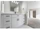 Modern bathroom with white cabinets and quartz countertop at 3490 Allegheny Dr, Las Vegas, NV 89122