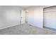 Bedroom with grey carpet, a closet and an additional room at 3490 Allegheny Dr, Las Vegas, NV 89122