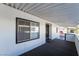 Covered patio with grey carpeting and exterior view at 3490 Allegheny Dr, Las Vegas, NV 89122