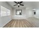 Dining area with wood-look flooring and built-in storage at 3490 Allegheny Dr, Las Vegas, NV 89122