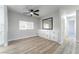 Bright dining area with wood-look flooring and built-in storage at 3490 Allegheny Dr, Las Vegas, NV 89122