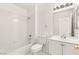 Clean bathroom with white vanity and bathtub at 3837 Willowview Ct, Las Vegas, NV 89147