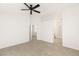 Bright bedroom with tile floors and access to closets at 3837 Willowview Ct, Las Vegas, NV 89147