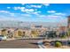 Aerial view of houses with city skyline in background at 421 Point Sur Ave, Las Vegas, NV 89138