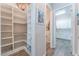 Spacious walk-in pantry with ample shelving for storage at 421 Point Sur Ave, Las Vegas, NV 89138