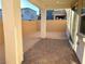 Private backyard with a covered patio and brick pavers at 4763 Illustria Ave, Las Vegas, NV 89141