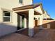 Covered patio and a view of the neighboring homes at 4763 Illustria Ave, Las Vegas, NV 89141