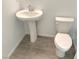 Simple bathroom with pedestal sink and tile flooring at 4763 Illustria Ave, Las Vegas, NV 89141