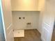 Convenient laundry room with built-in shelving at 4763 Illustria Ave, Las Vegas, NV 89141