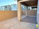 Covered patio and small backyard with block wall at 4771 Illustria Ave, Las Vegas, NV 89141