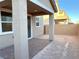 Covered patio and small backyard with block wall at 4771 Illustria Ave, Las Vegas, NV 89141